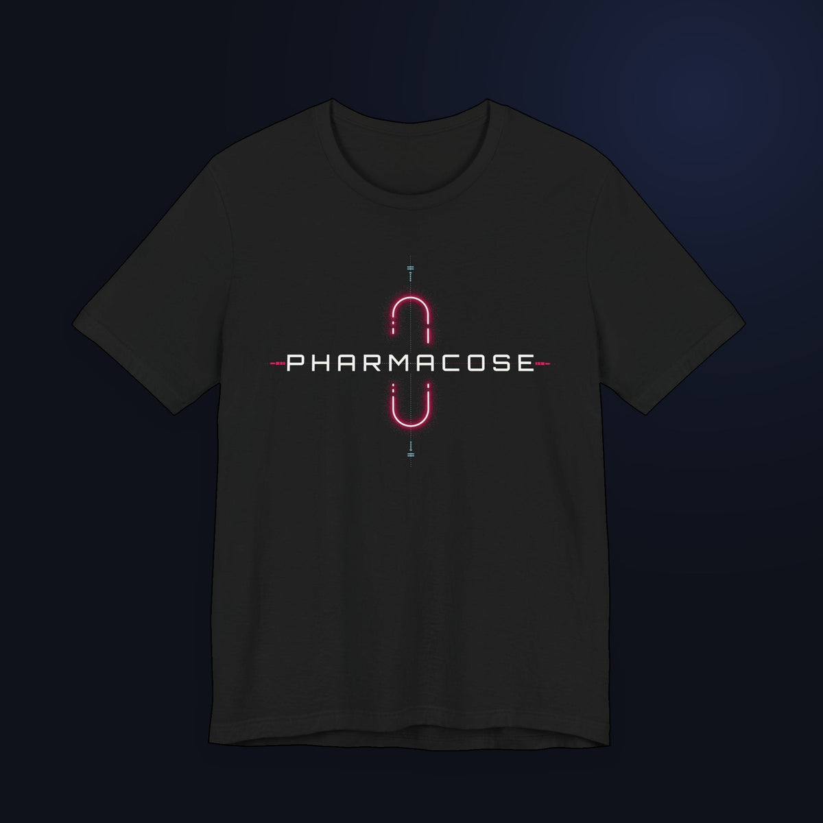 Black crew-neck T-shirt, front view. The white PHARMACOSE wordmark runs across the chest between the two halves of a split magenta capsule outline, with a thin vertical axis and small teal tick marks above and below.